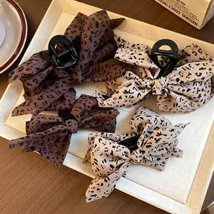 Luipaardprint Strik Haarclip Retro Acryl Stof Bananenclip Voor Vrouwen Mode Pendelaar Luipaard Strik Haaraccessoires