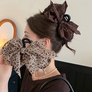 Grote haarklemmen met luipaardprint strik voor dames, elegante retro haaraccessoires