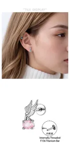 Close-up of F136 titanium angel wing cartilage stud with internal screw mechanism.