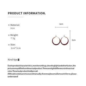 Retro polka dot hoop earrings info sheet showing 3cm dimensions and iron material details.