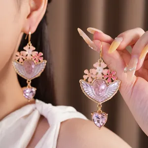 Orecchini pendenti angelo vintage con fiori in resina rosa e cristallo a cuore