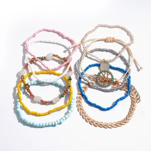 Lot de 10 bracelets de perles bohèmes colorées avec breloques arbre de vie et feuille