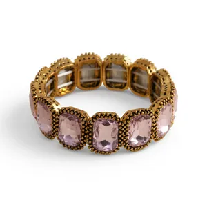 Vintage gold-tone elastic bracelet with square pink crystals for women's elegant fashion.