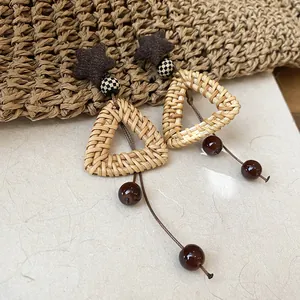 Böhmische Stern-Rattan-Dreieck-Ohrringe für Damen mit vintage ethnischen Stil-Details