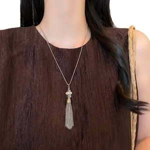 Vintage stainless steel beaded tassel necklace with shell pendant for women, elegant main view.