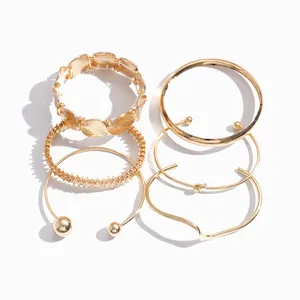 Elegante set van 6 goudkleurige onregelmatige geometrische metalen armbanden voor dames