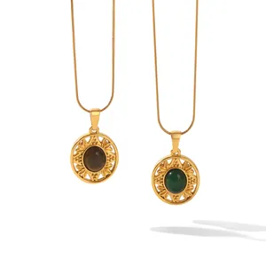 Detailed view of vintage sunburst necklaces featuring green and brown natural stones.