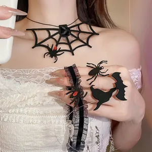 Close-up detail of Halloween gothic choker necklace with spider web and bat charms