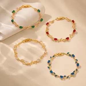 Bracelets feuilles élégants plaqués or 18 carats avec zircons colorés et fermoir montre.