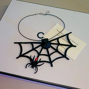 Gothic spider web choker necklace with red gem spider charm for Halloween parties.