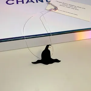 Detailed view of the Halloween witch hat choker with a transparent invisible line