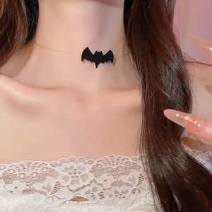 Detailed close-up of a gothic black bat choker necklace featuring an invisible string
