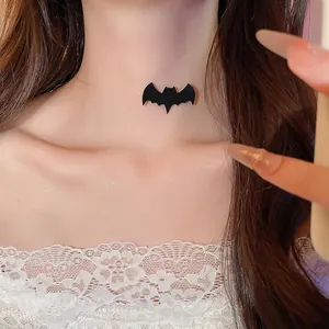 Detail of a minimalist black bat choker necklace with invisible cord for Halloween