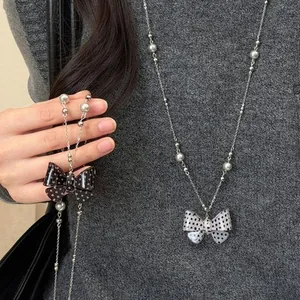 Koreanischer Stil Schleife Anhänger Halskette Harz Legierung Künstliche Perle Lange Pulloverkette Für Damen Modeschmuck