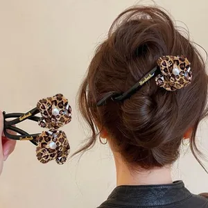 Elegant leopard print flower hair twist clip for women's bun hairstyles in a stylish back view