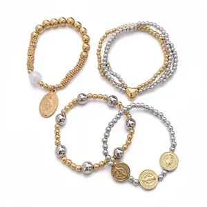 4pcs set of gold and silver beaded elastic bracelets with religious coin and heart pendants