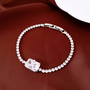Detail of 18k gold-plated bracelet with square zircon and elegant butterfly motif