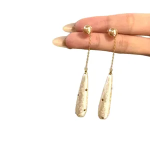 Elegant Korean style long gold teardrop dangle earrings with unique polka dot texture
