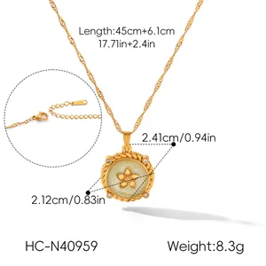 Detail of gold-plated necklace with round floral pendant and measurement specifications