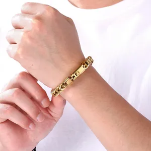Close-up of men's gold stainless steel wheat chain bracelet with square clasp