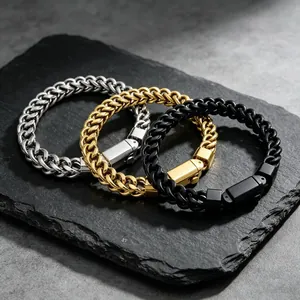 Detail view of men's stainless steel dragon bone bracelets in silver, gold, and black