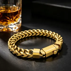 Detailed shot of a gold stainless steel wheat chain bracelet for men with square clasp.