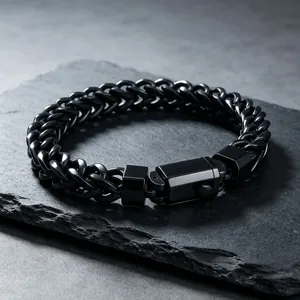 Close-up of black stainless steel Franco chain bracelet with square snap buckle clasp