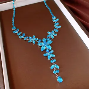 Elegant blue zirconia flower necklace with teardrop pendant, high-end jewelry detail