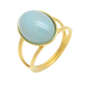 Vintage oval blue cat eye stone ring with a minimalist gold geometric stainless steel band