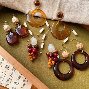 Retro Maillard style resin dangle earrings set with vintage aesthetic jewelry designs
