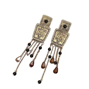 Retro vintage geometric gold earrings with long tassels and acrylic water drop beads