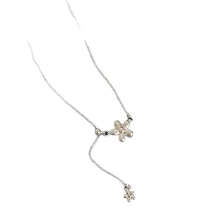 Silver flower pendant lariat necklace with minimalist floral charms for daily wear