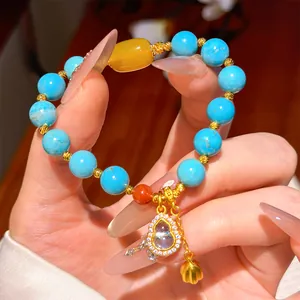 Detailed view of New Chinese style resin beaded bracelet with zircon gourd pendant.