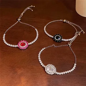 Elegante Franse luxe zirkoon tennisarmbanden met ovale hangers getoond in drie kleuren