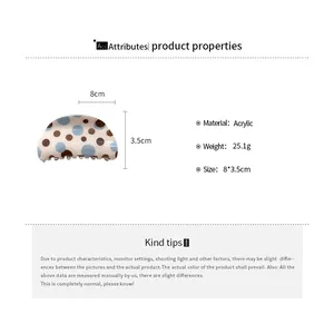 Acrylic hair claw clip with blue and brown polka dots, 8x3.5cm size and weight details