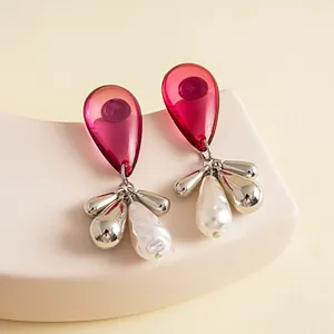 Elegant vintage acrylic pink teardrop earrings with pearl tassels and silver finish accents