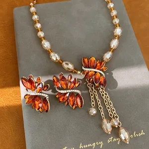 Vintage amber crystal necklace and earrings set with champagne beaded chain detail