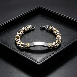 Detail shot of the two-tone Byzantine chain and polished curved plate for engraving