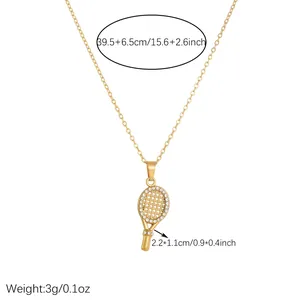 Detailed view of gold tennis racket pendant necklace with dimensions and weight info