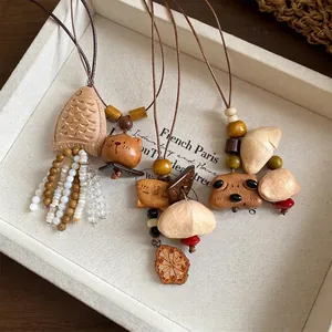 Collana con Pendente Animale in Legno Stile Etnico Vintage Corda in Cuoio Nappina di Conchiglia Catena Lunga per Maglione Gioielli Donna