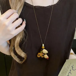 Collana retrò con ciondolo a forma di orso in legno e conchiglia per donna