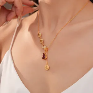 Detail of 18k gold plated necklace with red gourd pendant in New Chinese style