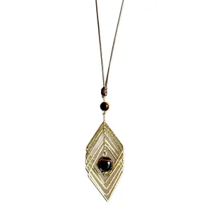 Collier vintage Maillard en cordon cuir avec œil de tigre et pendentif losange ajouré