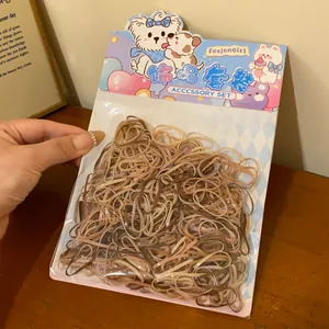 Set van neutrale bruine en beige elastische haarbandjes voor meisjes in leuke verpakking