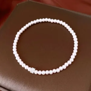Bracelet élégant en perles de style français avec breloque fleur en zircone étincelante