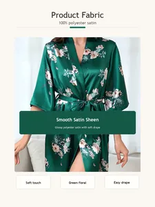 Detailed view of green floral satin bathrobe featuring smooth 100% polyester fabric