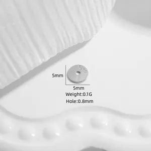 Close-up of 5mm S925 sterling silver spacer with 0.8mm hole and 0.1g weight for DIY