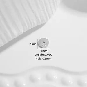 Detail view of 4mm S925 sterling silver ultra-thin flat round spacer bead for DIY