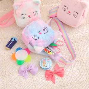 Close-up of cute plush cat pencil case showing interior storage for stationery items