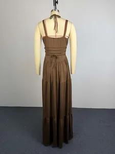 Back view of brown tiered maxi dress featuring elegant high waist wrap-around tie